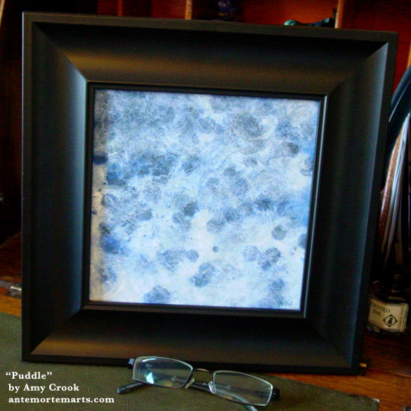 Puddle, framed art by Amy Crook
