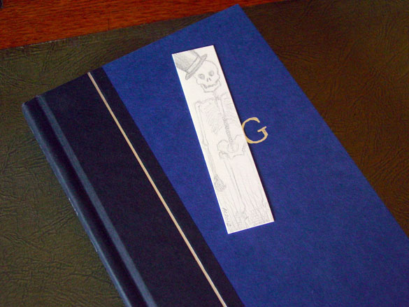 Skeleton Bookmark, with book, by Amy Crook