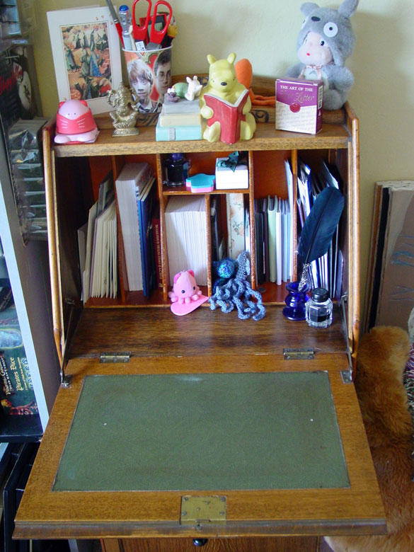 the inside of my writing desk, including a lot of adorable photography props