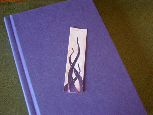 Tentacle Bookmark 4, with book, by Amy Crook